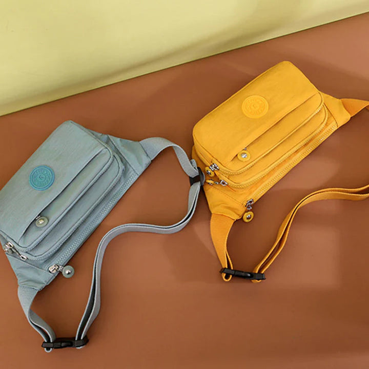 Close-up of the durable nylon fabric on a women's lightweight crossbody bag, black finish