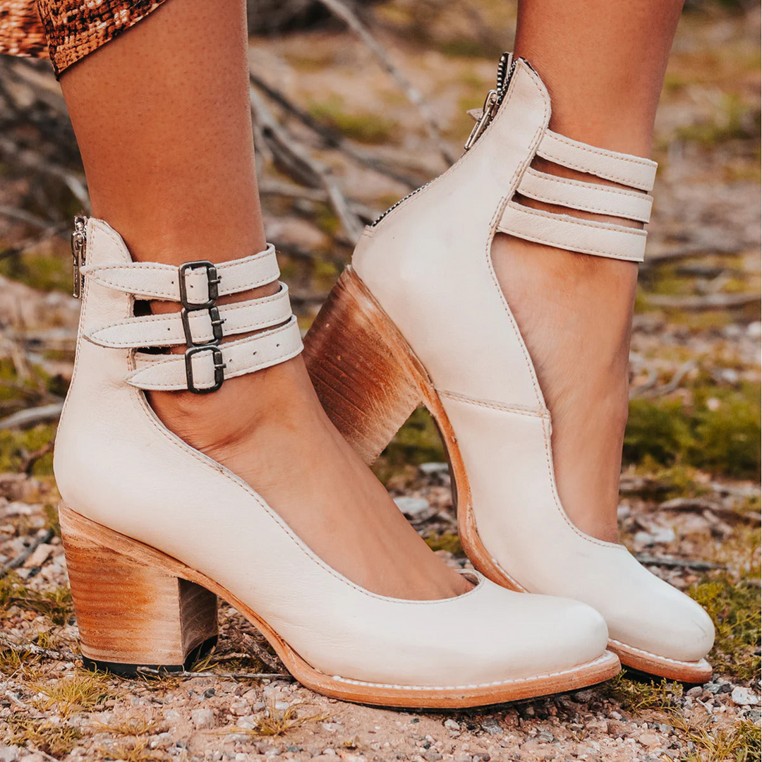 Stylish women's multi-strap ankle boots with a comfortable block heel; versatile casual footwear.