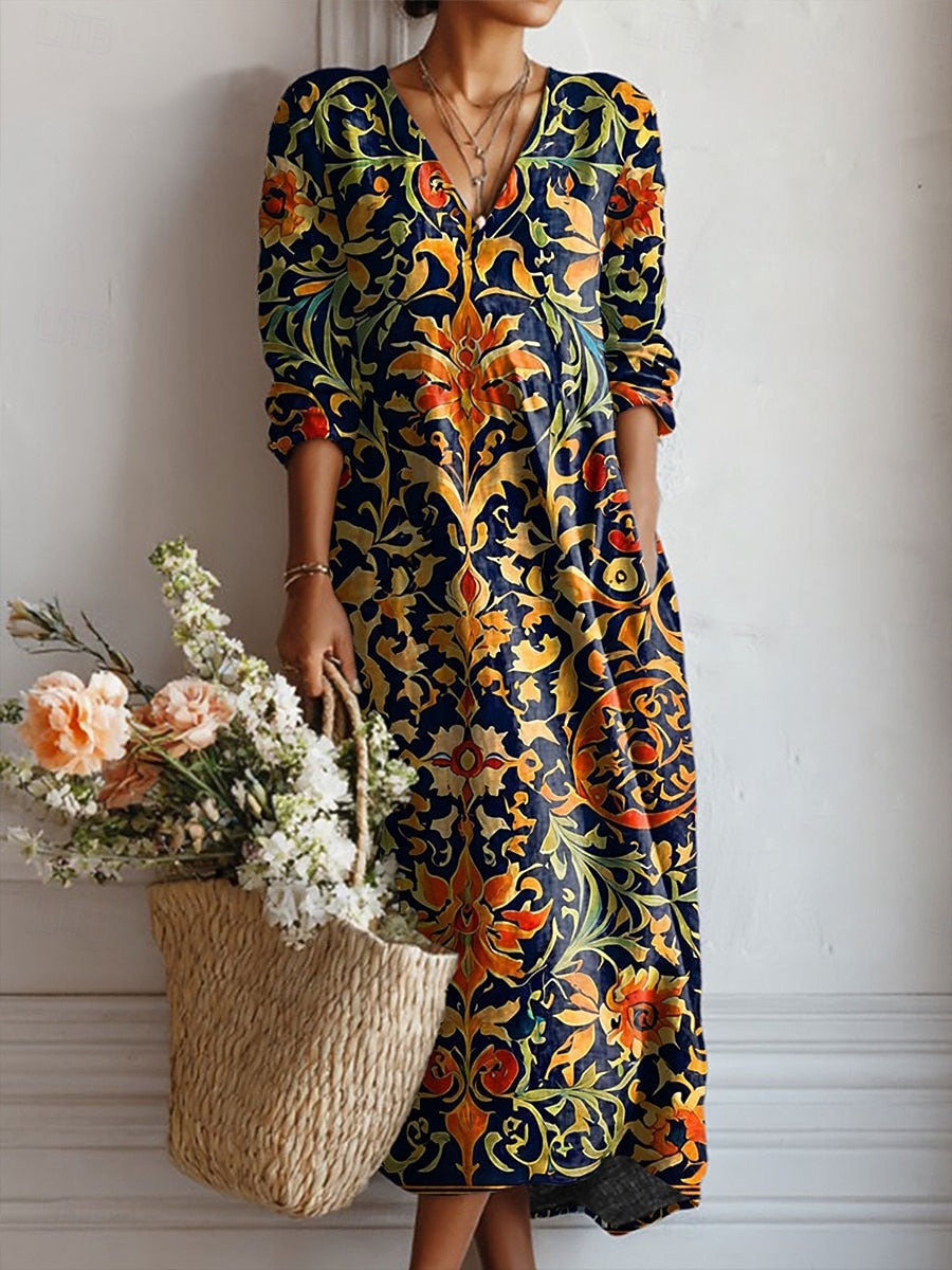Women's navy boho midi dress with a v-neck and ornate baroque scroll print, perfect for summer casual wear.
