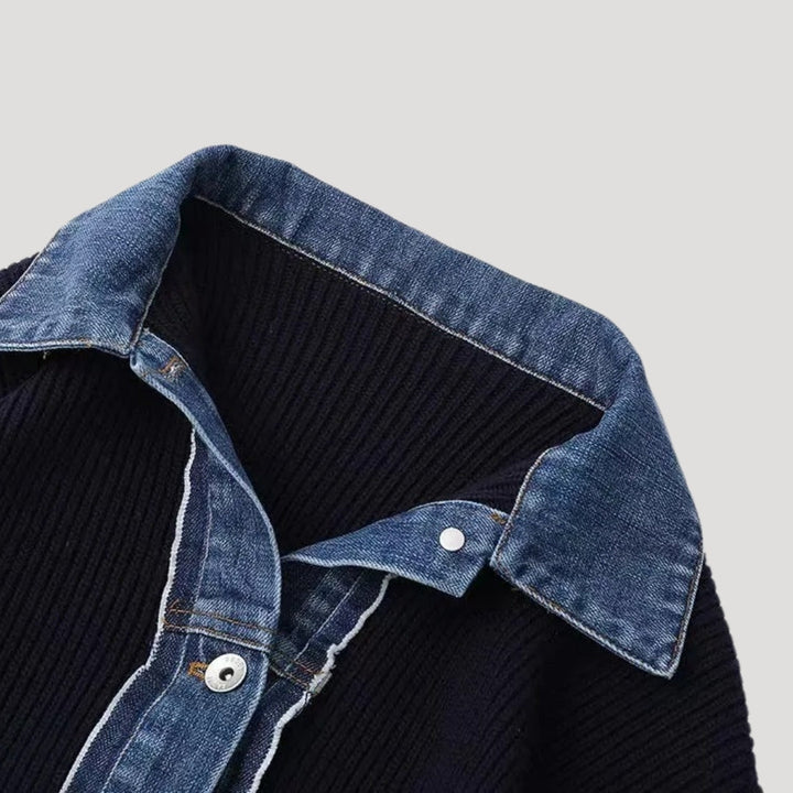 Close-up of a women's navy layered button cardigan jacket, showing button-down detail & fabric.