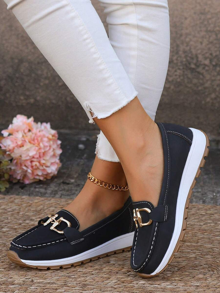 Comfortable women's slip-on loafers with arch support & non-slip sole for everyday wear.