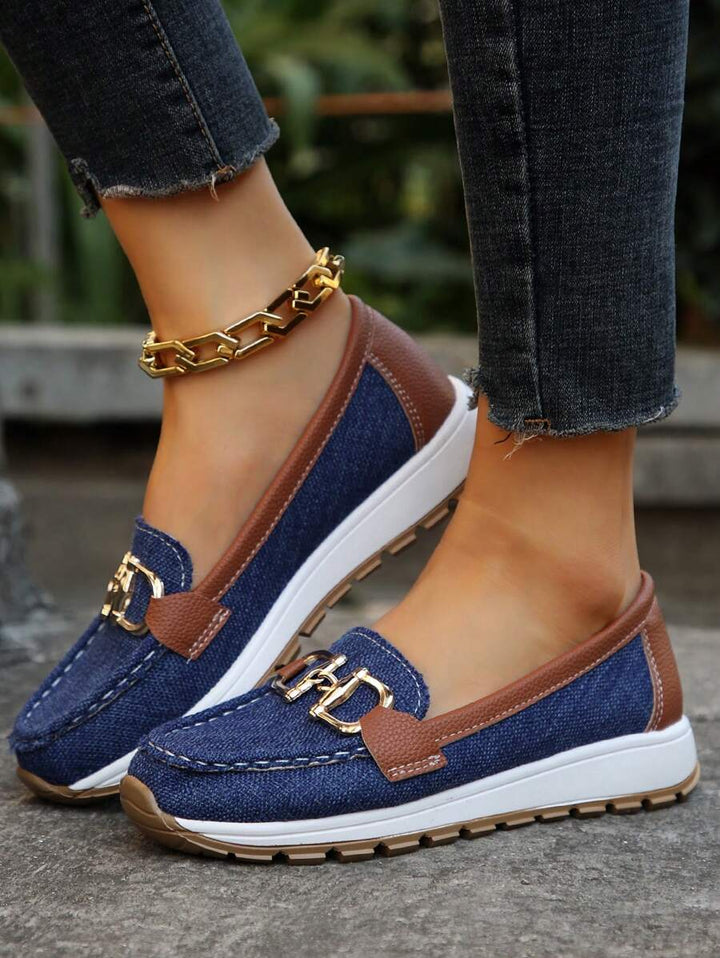 Interior view of comfortable women's loafers showcasing arch support and cushioned footbed.