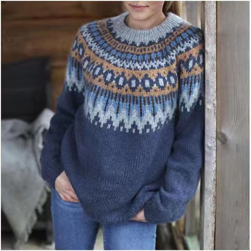 Cozy knit women's sweater with pink Nordic pattern, providing warmth for winter