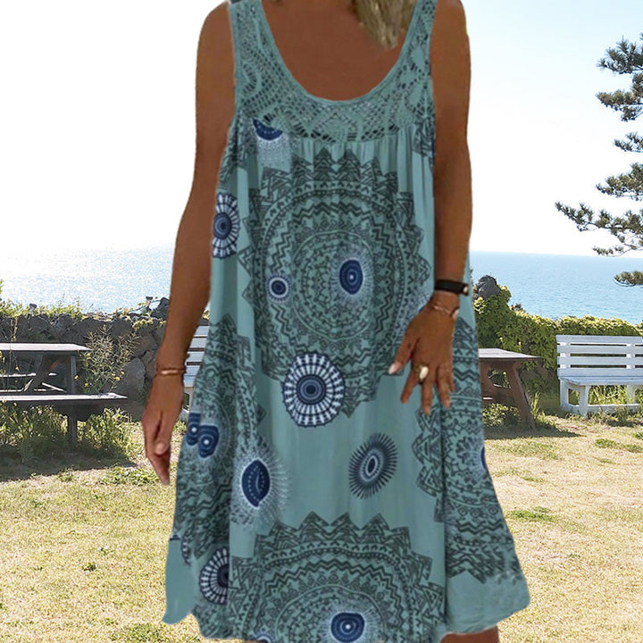 Elegant O-neck women's dress, sleeveless with a beautiful floral pattern