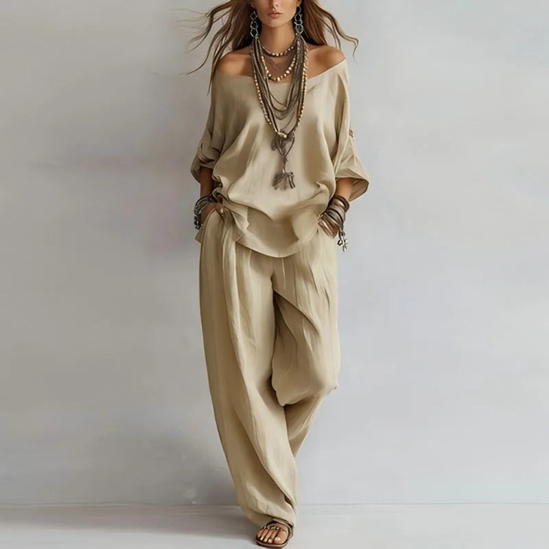 Chic women's off-shoulder co-ord set. Comfortable wide-leg pant two-piece outfit, perfect for summer loungewear.