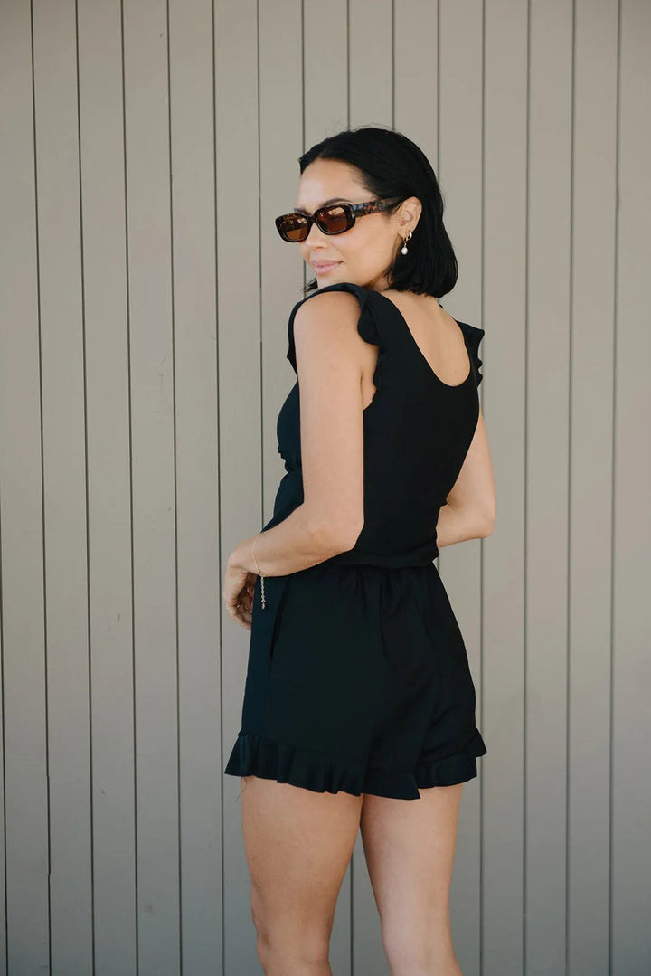Stylish women's one-piece swimsuit for beach & pool, featuring a flattering fit and supportive built-in bra.