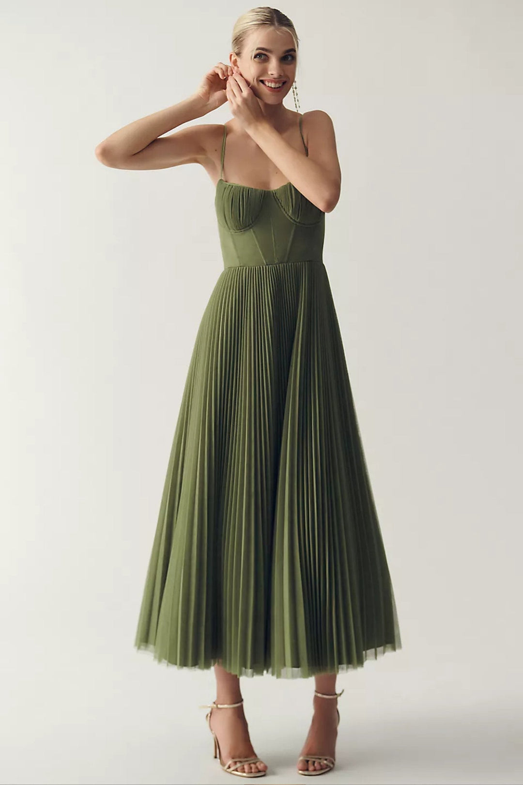 Stylish women's one-shoulder midi dress with a flowing pleated tulle skirt, suitable for weddings & parties.