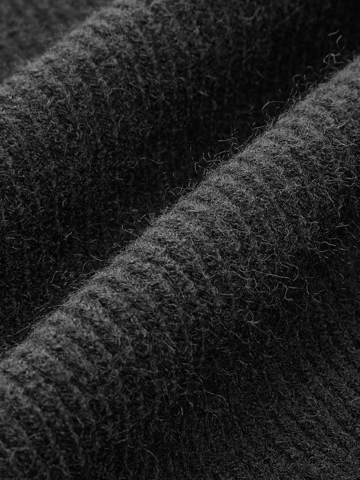 Detail of the long sleeve & open front on a women's casual shrug sweater. Perfect for layering.