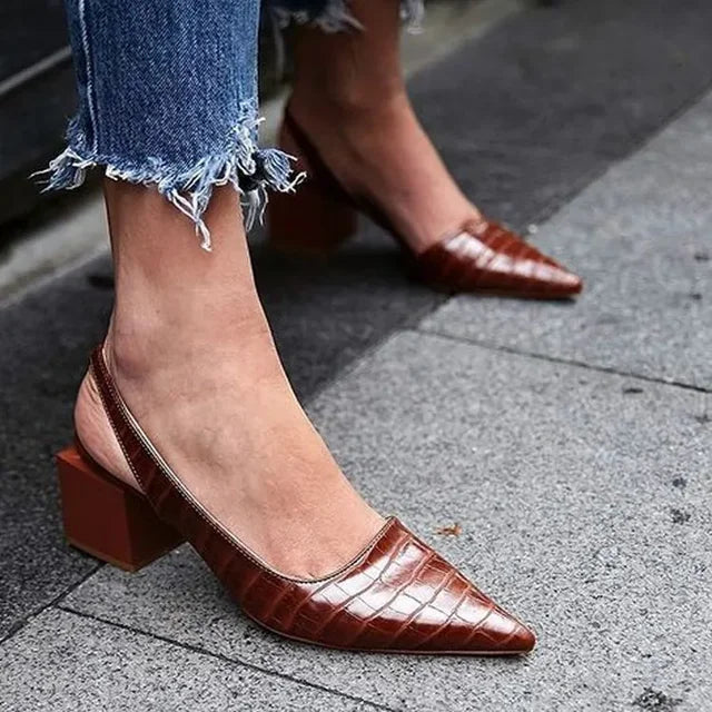Women's orthopedic block heels for superior comfort and style. Elegant pointed toe and slingback design for daily wear.