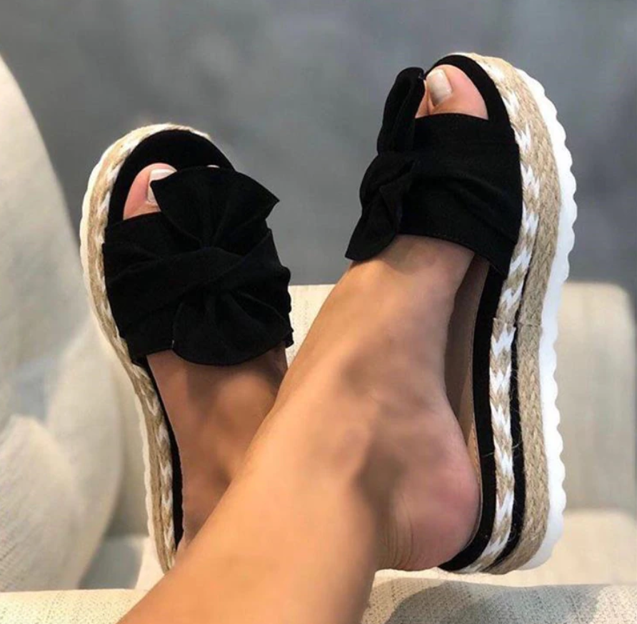 Chic women's orthopedic sandals with a decorative bow & platform sole. Designed for stylish summer comfort.