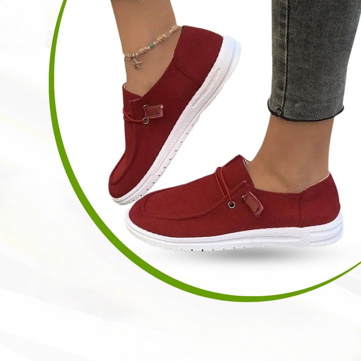 Ergonomic women's leisure shoes, slip-on style, providing orthopedic comfort & arch support for daily wear.
