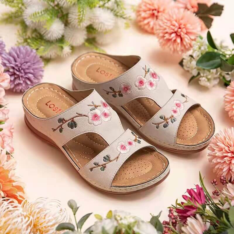 Women's orthopedic floral sandals with arch support for comfort and pain relief.