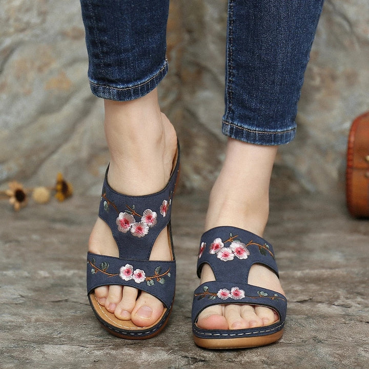 Stylish floral women's sandals with orthopedic arch support for pain relief & walking.