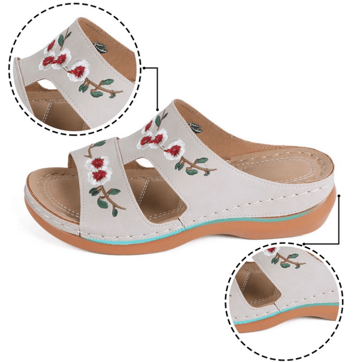 Floral design orthopedic sandals for women, ensuring arch support and walking comfort.