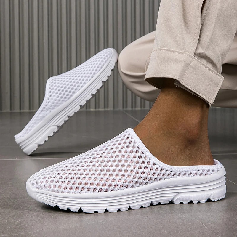 Women's orthopedic mesh slip-on sneakers with arch support for comfortable walking.