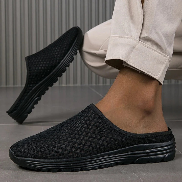 Durable women's orthopedic walking shoes, mesh slip-on design with arch support for active lifestyles.