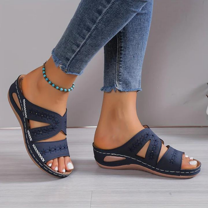 Women's orthopedic open-toe sandals, offering cushioned comfort & supportive arch for daily wear.
