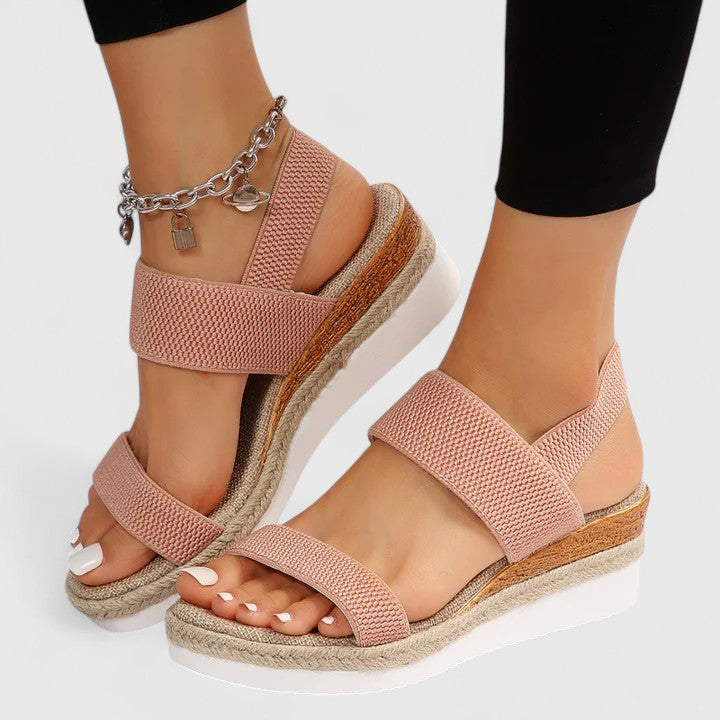 Relief for plantar fasciitis with women's orthopedic open-toe wedge sandals. Arch & heel support for comfort.