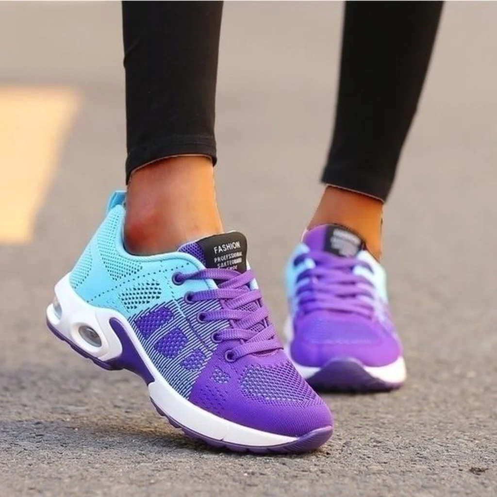 Top view of comfortable women's orthopedic running shoes, accommodating both wide and narrow feet with ease.