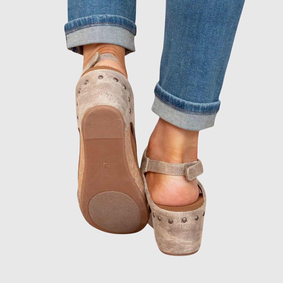Stylish women's wedge sandals, providing elegant arch support for ultimate comfort.