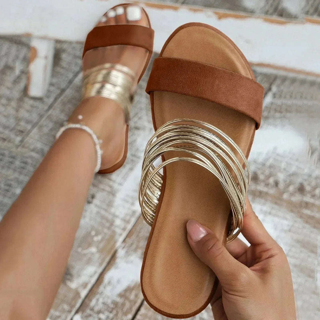 Ergonomic women's sandals, offering supportive arch design for all-day comfort and healthy feet.