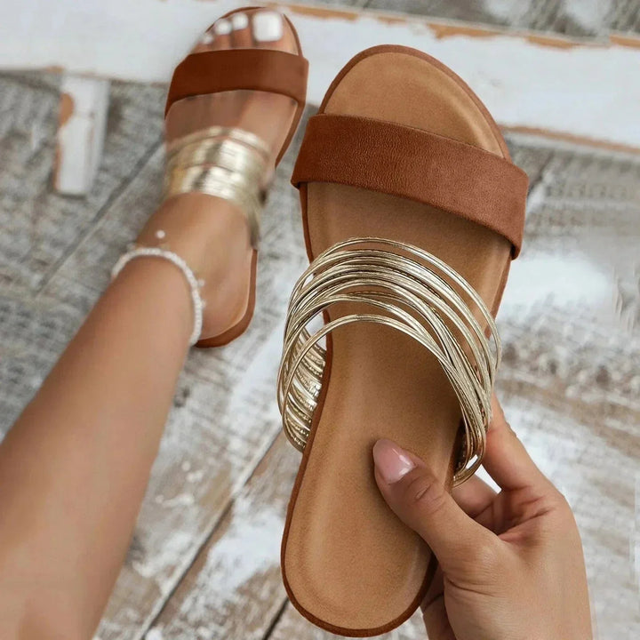 Ergonomic women's sandals, offering supportive arch design for all-day comfort and healthy feet.
