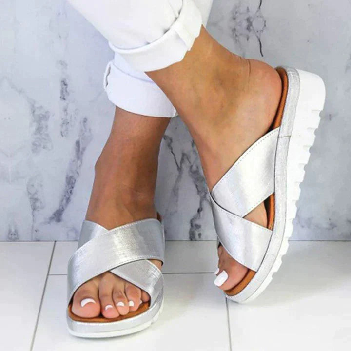 Women's orthopedic sandals with adjustable straps and arch support for comfortable walking and daily wear.