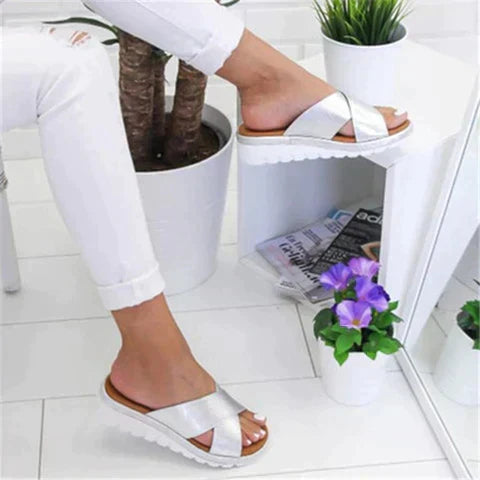 Ergonomic women's orthopedic sandals featuring adjustable straps and contoured arch support for healthy feet.