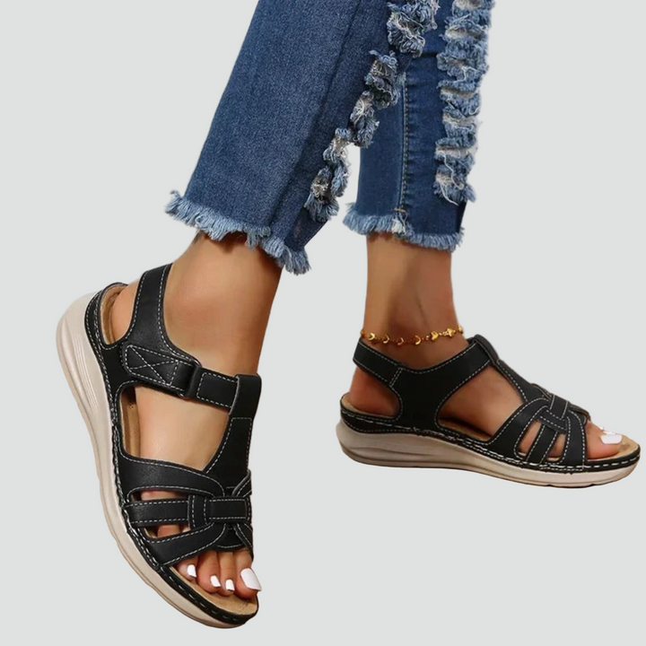Daily wear women's orthopedic footwear, featuring adjustable Velcro straps for superior comfort.