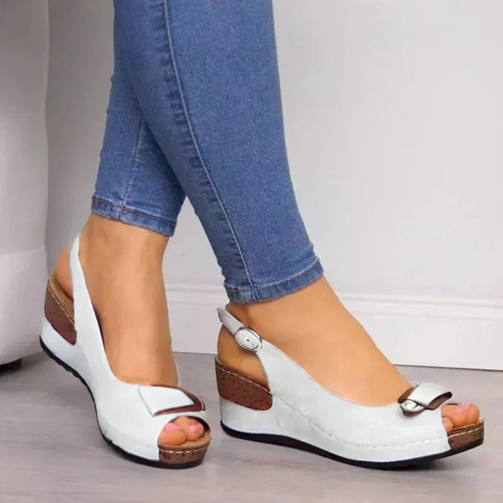 Stylish women's orthopedic sandals, designed with cushioned footbed and arch support for ultimate comfort.