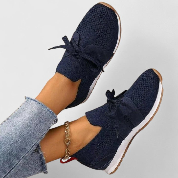 Breathable mesh women's slip-on sneakers for walking, offering orthopedic comfort and lightweight feel.