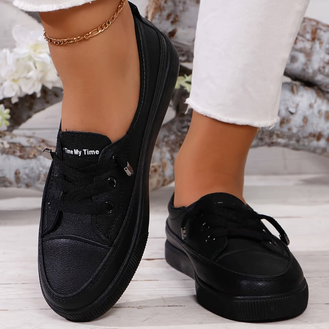 Black women's orthopedic sneakers, offering superior arch support & comfort for casual wear.