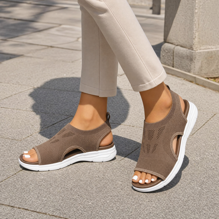 Comfortable women's orthopedic sandals with arch and foot support, ideal for walking & summer wear.