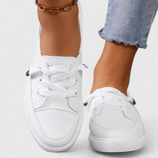 Comfortable women's orthopedic walking shoes for arch support & pain relief. Ideal for daily wear.