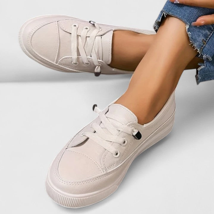 Lightweight, breathable women's orthopedic sneakers with superior arch support for active lifestyles.
