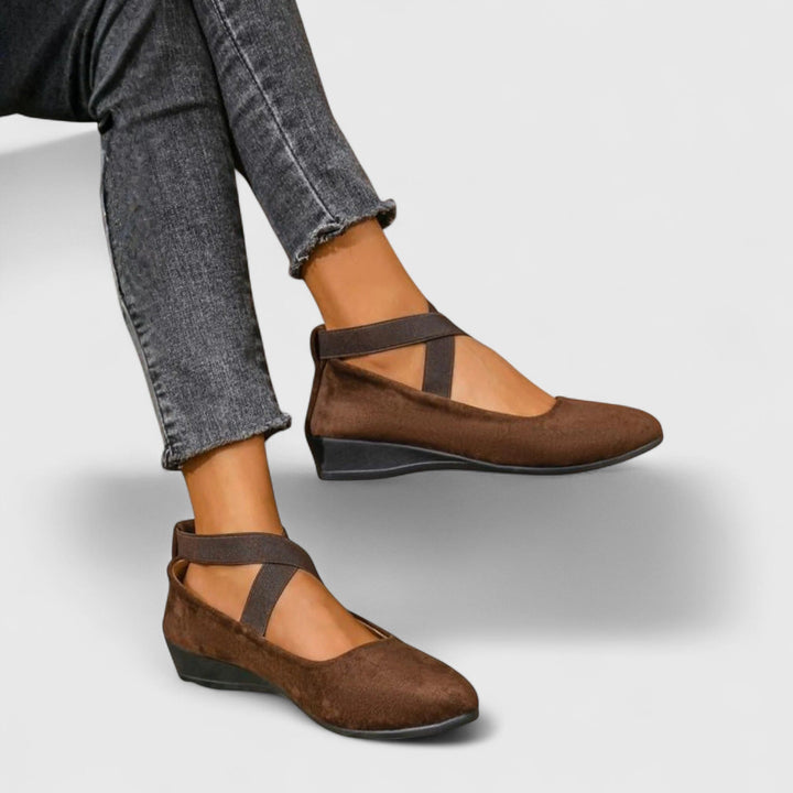 Everyday women's wedge sandals with adjustable cross straps, designed for orthopedic arch support.