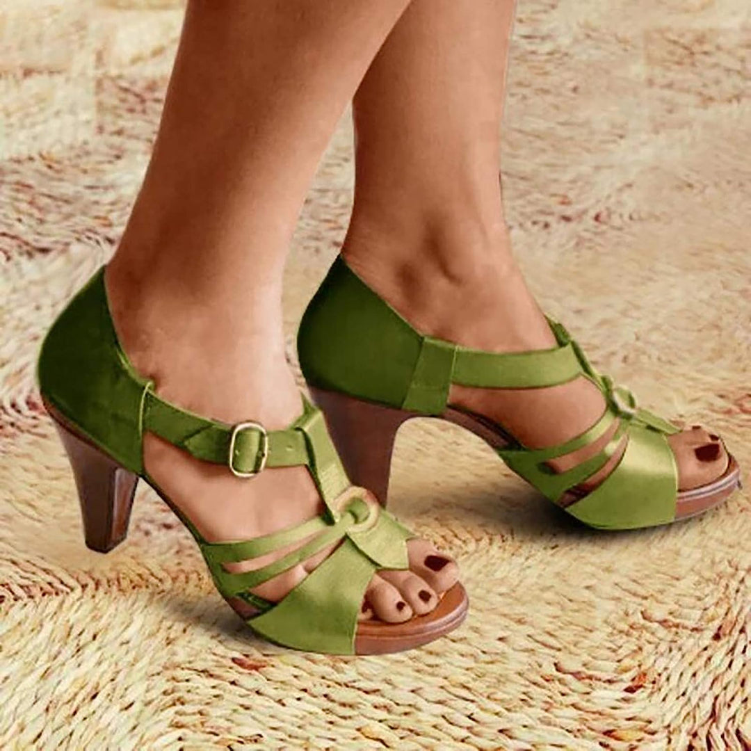 Detailed view of arch support in women's comfortable orthopedic wedge sandals.