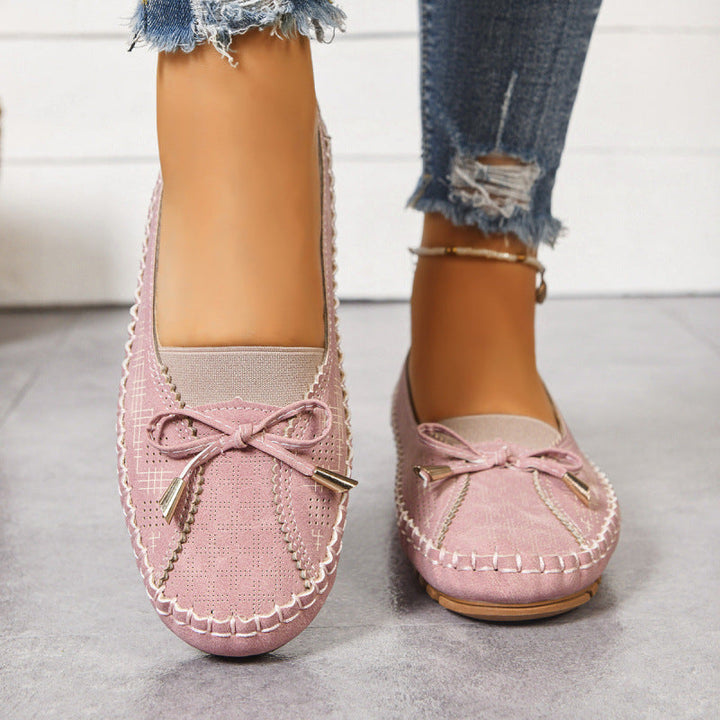 Pink wide fit slip-on orthopedic loafers for women, providing all-day cushioned comfort.