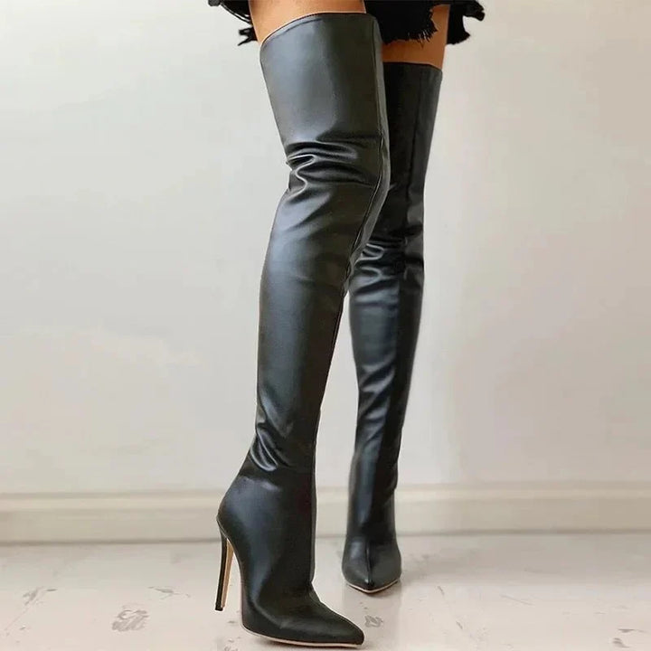 Chic women's over-the-knee boots with a pointed toe, slim fit, and elegant stiletto heel. A fashion essential.
