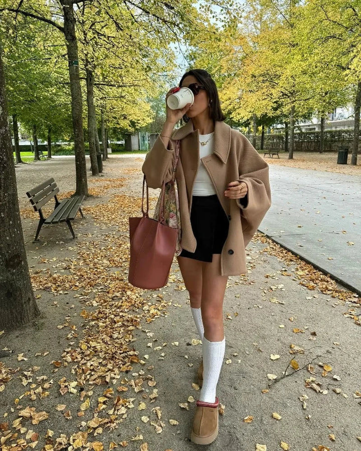 Versatile women's oversized button jacket, ideal for fall fashion and spring outerwear.
