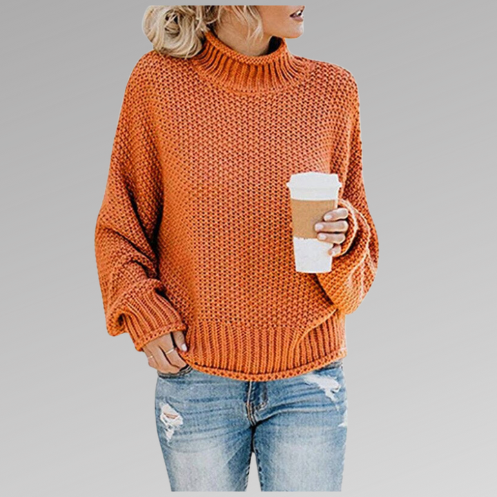 Women's oversized chunky knit turtleneck sweater. Cozy, relaxed fit for warm fall & winter fashion.