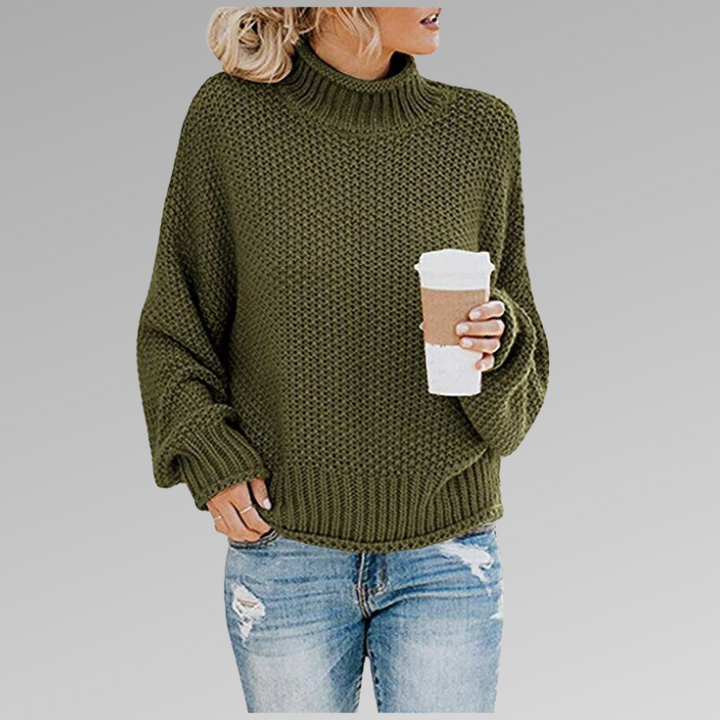 Cozy women's chunky knit turtleneck sweater, perfect for warm, comfortable everyday wear. Relaxed pullover.