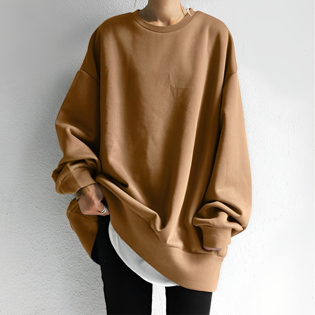 Stylish women's oversized pullover sweatshirt with dropped shoulders for ultimate comfort & a modern casual look.