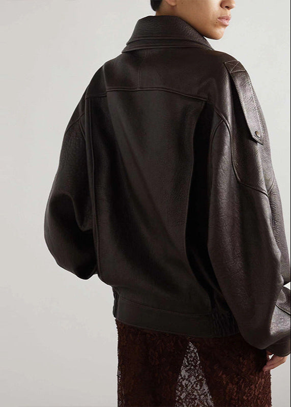 Casual yet stylish women's belted bomber jacket, brown faux leather, perfect for layering.
