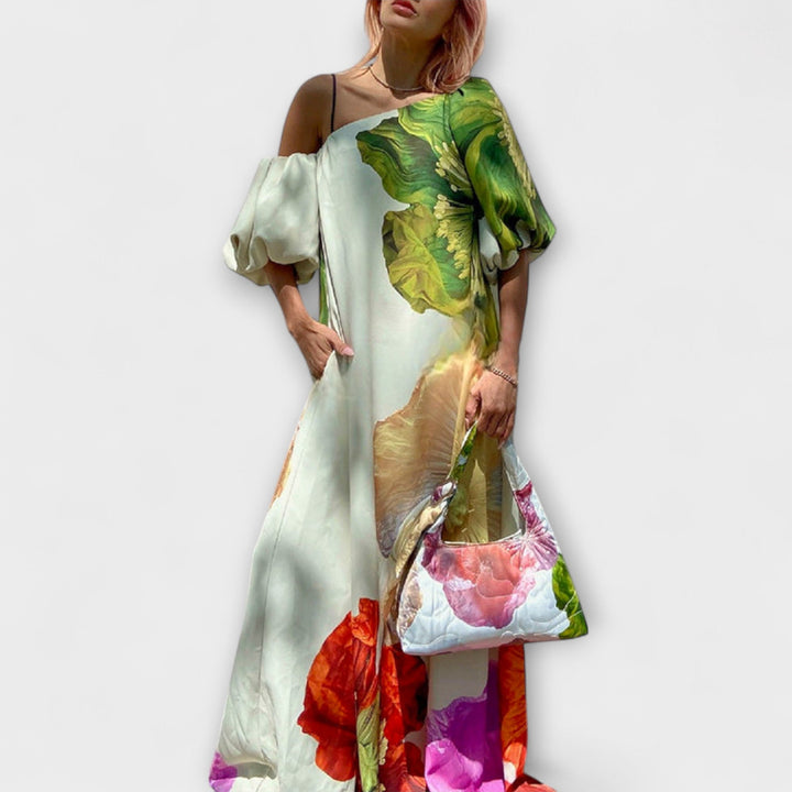 Women's oversized floral off-shoulder maxi dress with puff sleeves, perfect for elegant summer occasions.