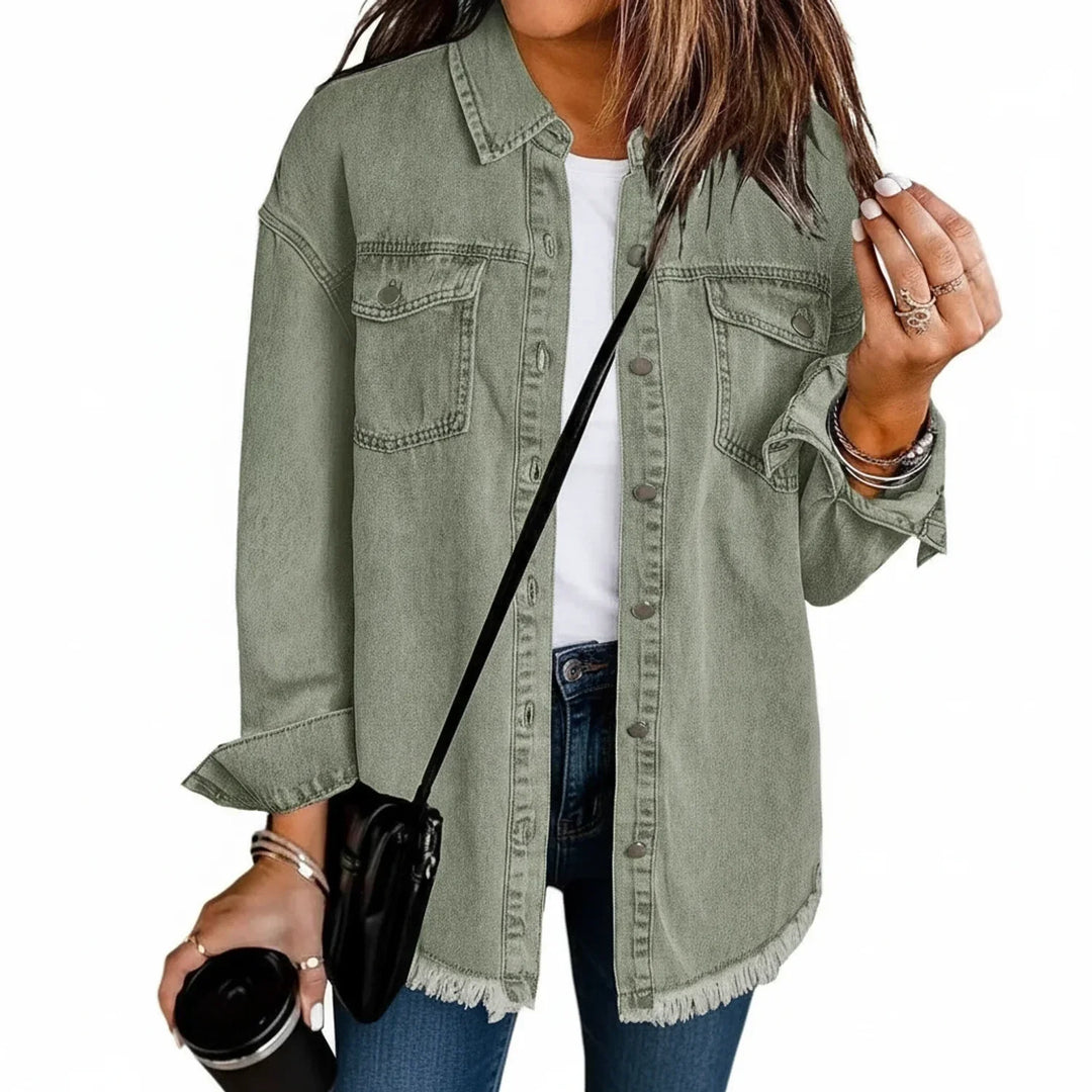Chic women's oversized jacket, a versatile layering piece with a distinctive fringe hem.