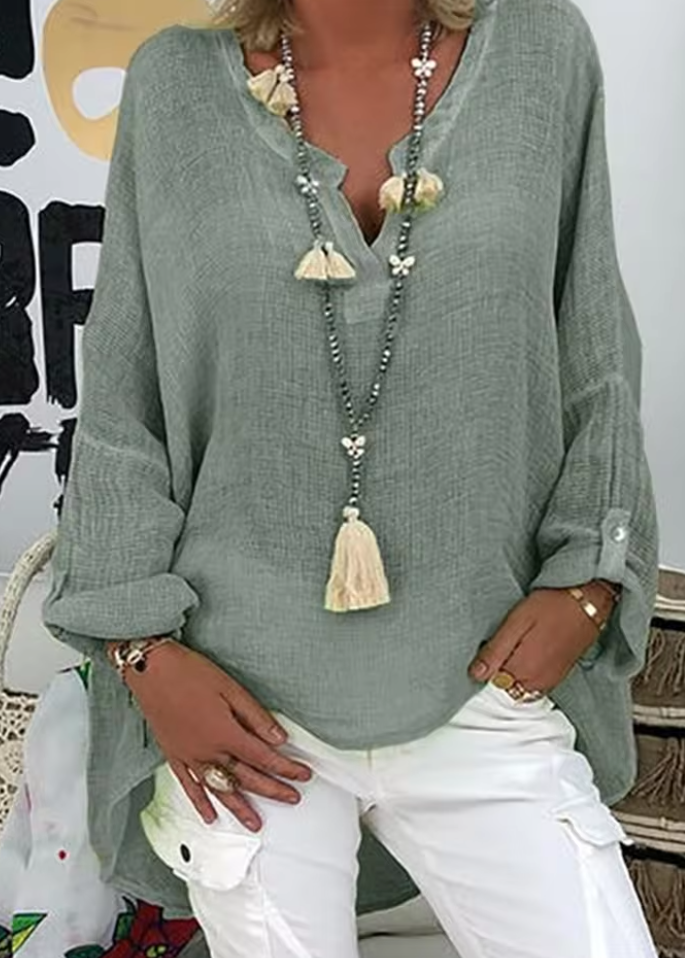 Effortlessly stylish women's oversized long sleeve blouse, comfortable & modern for daily wear.