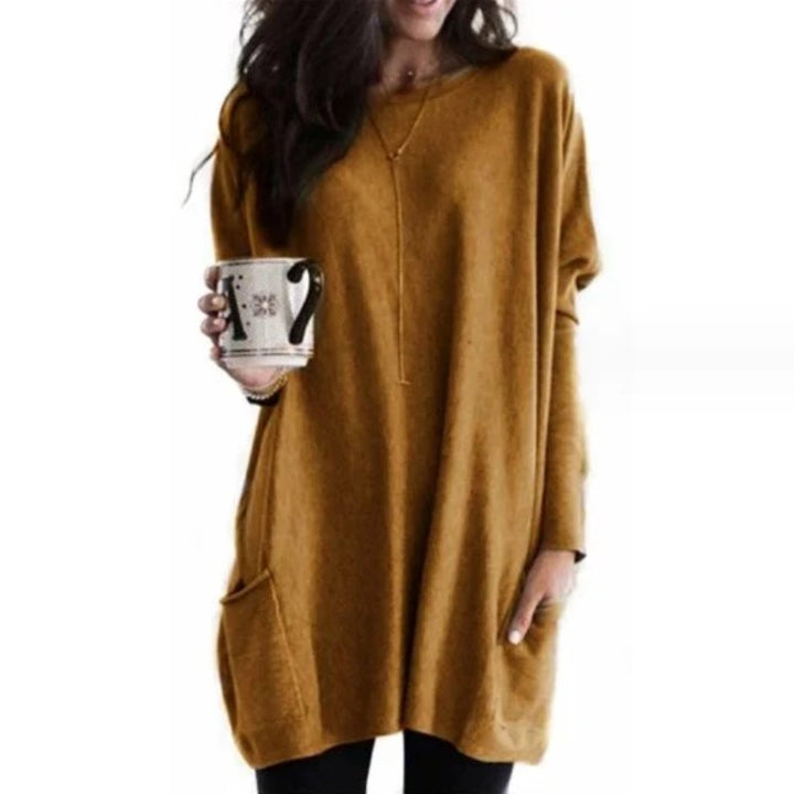 Effortlessly stylish women's long sleeve oversized tunic top with a relaxed fit and handy pockets.