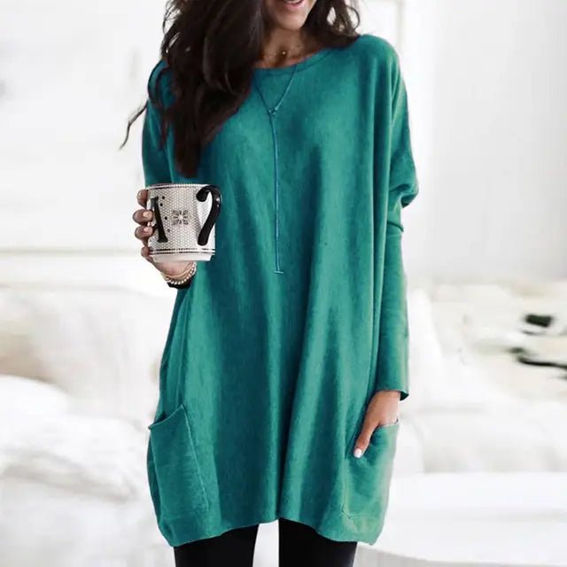 Everyday women's oversized long sleeve tunic featuring a relaxed fit and stylish front pockets.