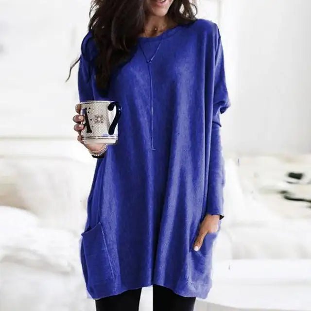 Soft women's casual oversized long sleeve tunic top with handy side pockets, great for comfort.